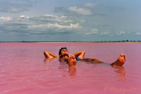 Tourist Floating on Lake Hillier